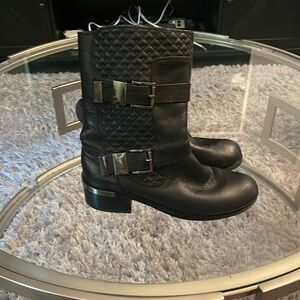 Black motorcycle boots.